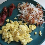 Crist bacon, scrambled eggs, and hash browns