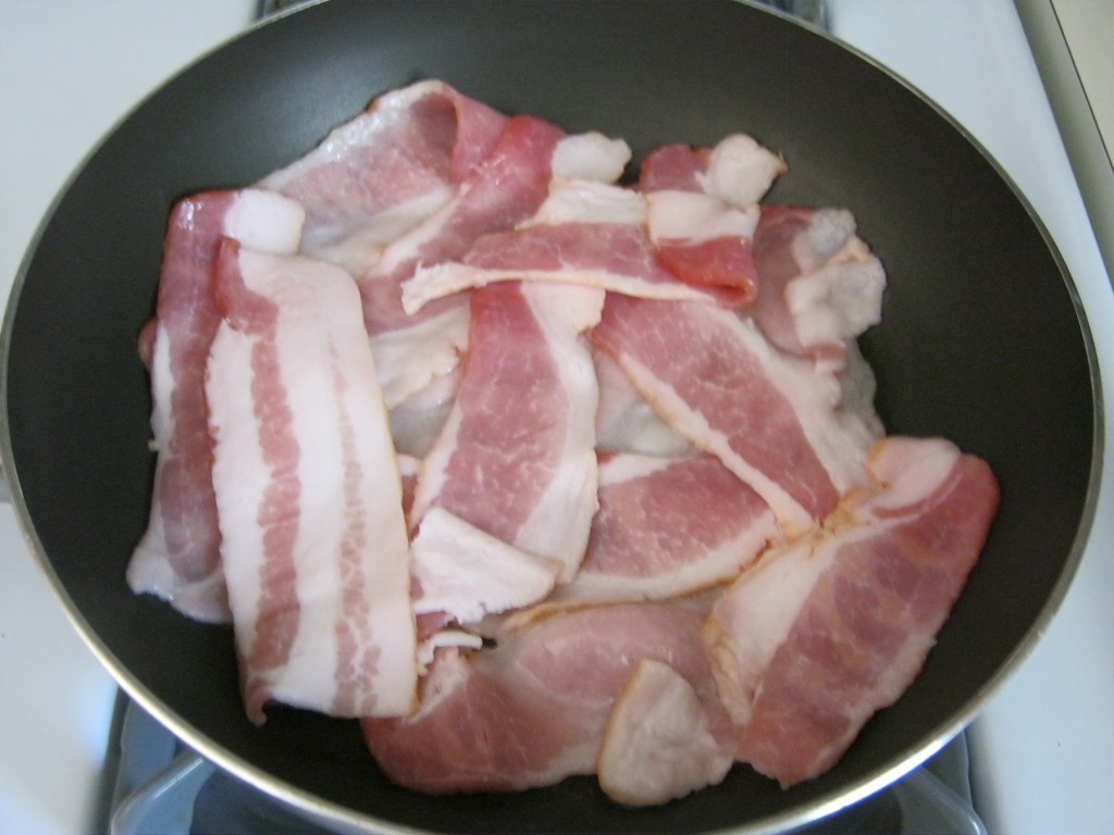 Bacon in a frying pan