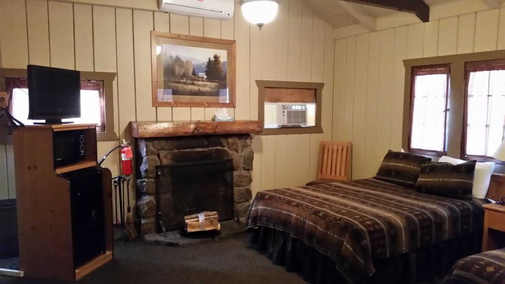 Sylvan Lake Lodge bed, fireplace, and appliances.
