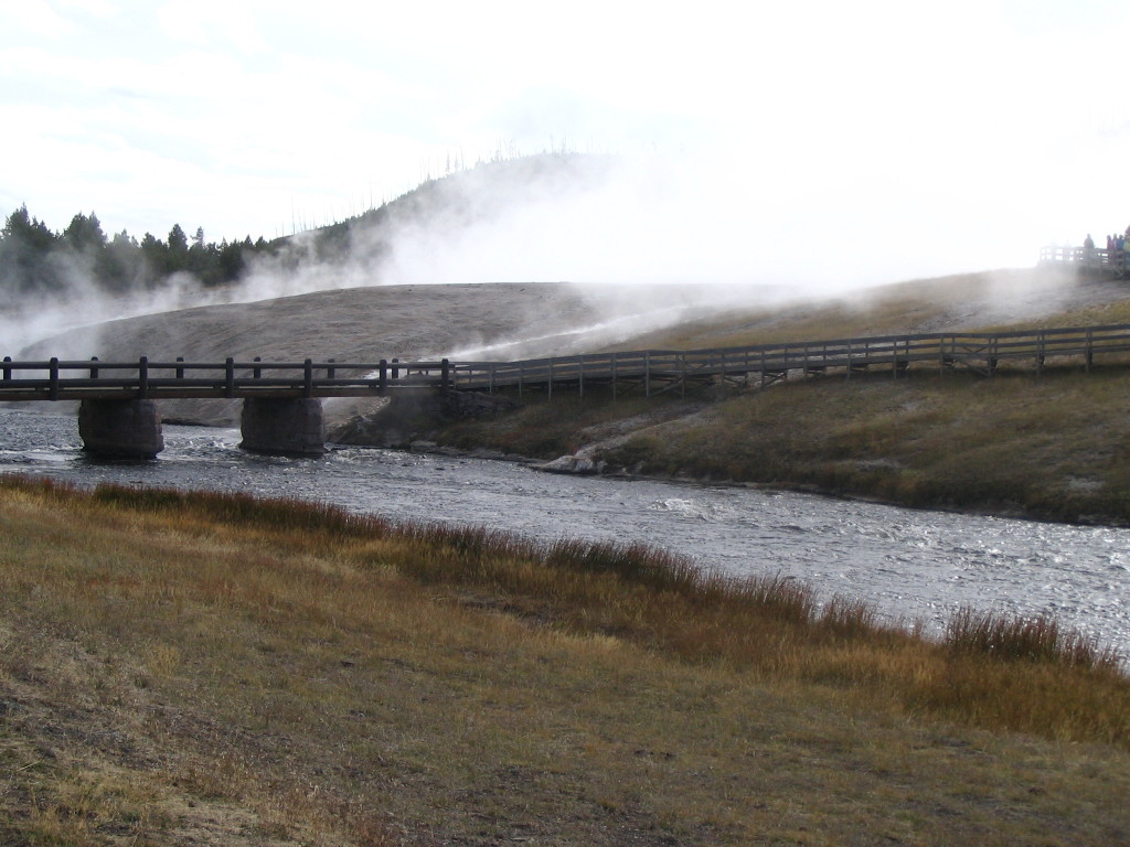 A bridge and steam in Yellowstone