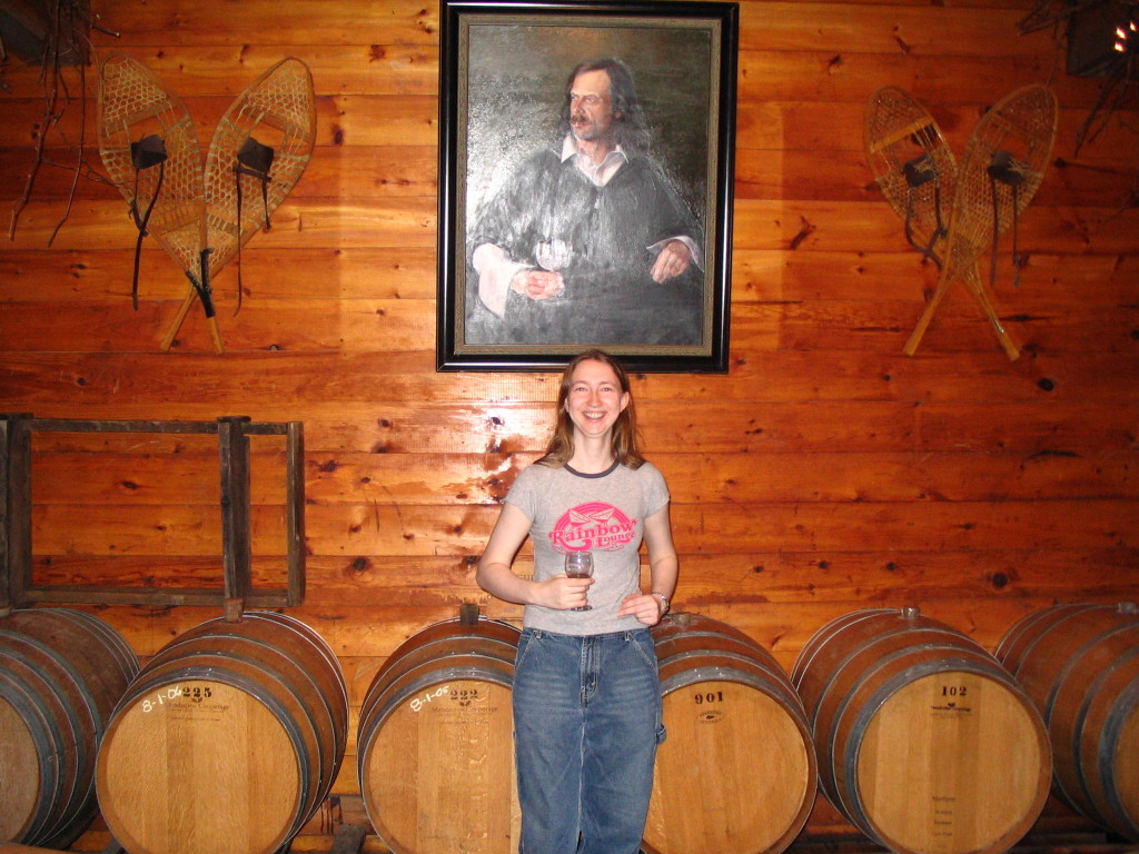 wine casks and portrait at Alexis Bailly